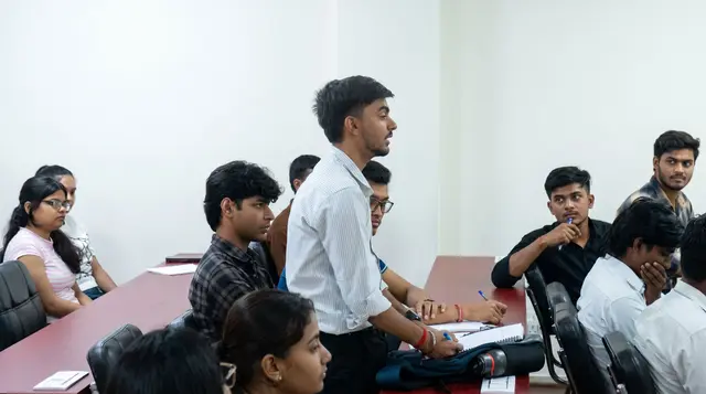 A student presents an idea in class