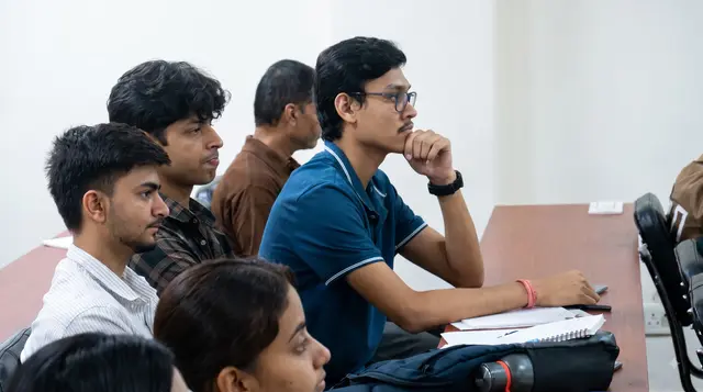 PRTF students listening closely during a session